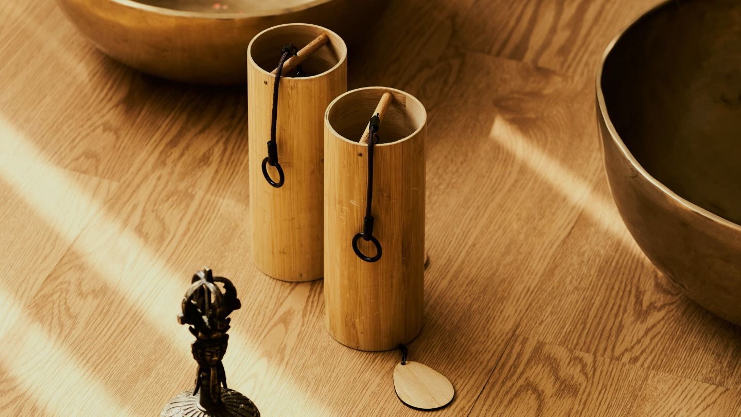Chimes and singing bowls used in a sound bath session